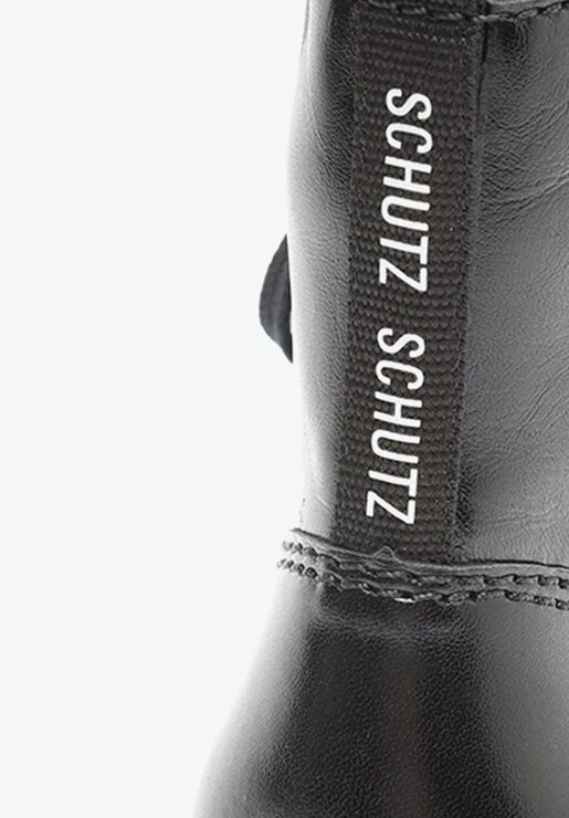 BOTA COTURNO PRETA SCHUTZ SALTO MÉDIO COURO