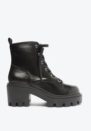 BOTA COTURNO PRETA SCHUTZ SALTO MÉDIO COURO
