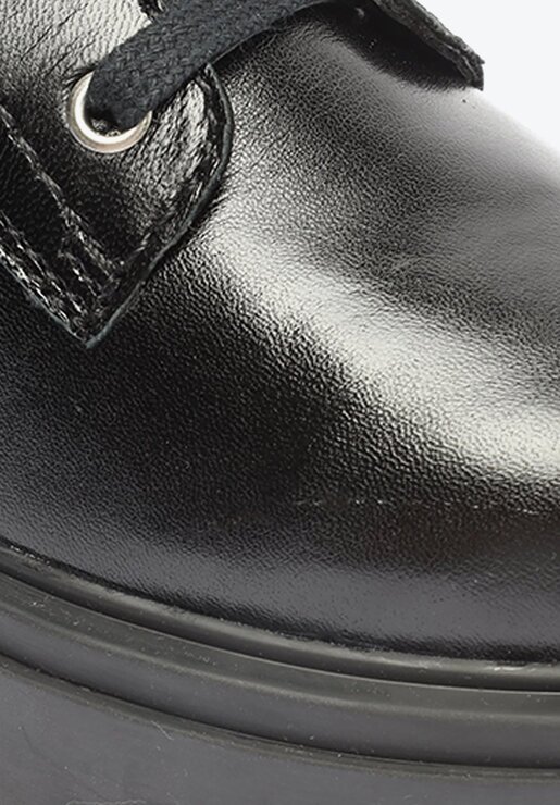BOTA COTURNO PRETA SCHUTZ SALTO MÉDIO COURO