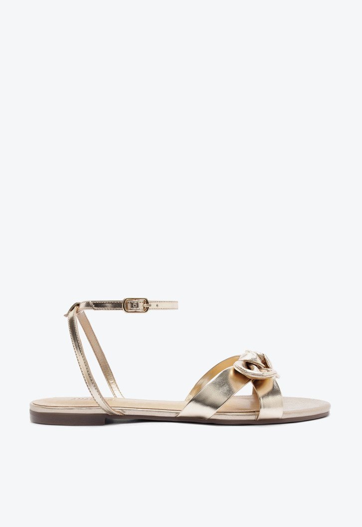 Sandália Rasteira Laço Maximalista Dourada