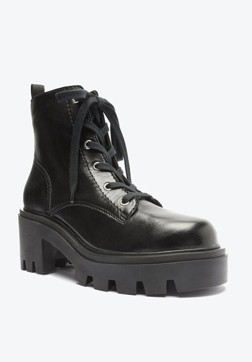 BOTA COTURNO PRETA SCHUTZ SALTO MÉDIO COURO